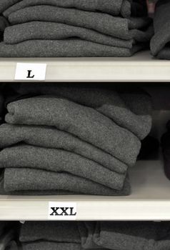 Cloths on a shelf in a department store