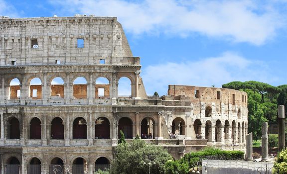 Colosseum against blue sky in Rome, Italy
