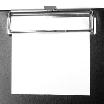 A piece of blank paper on clipboard