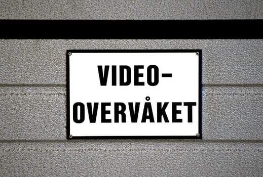 Norwegian sign.
Text on sing in Norwegian: Video overvåket