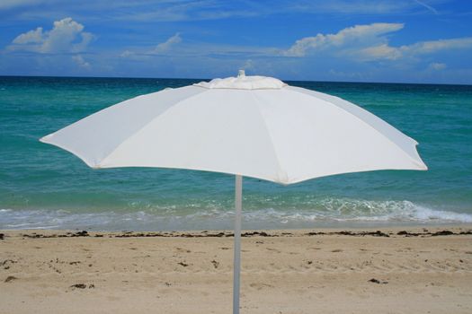 Close up of a beach umbrella on a sunny day.
