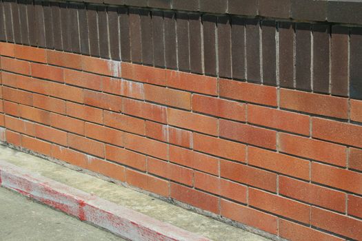 Close up of a brickwall showing unique pattern.
