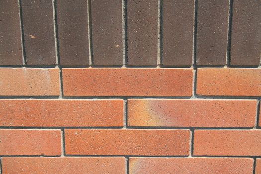 Close up of a brickwall showing unique pattern.
