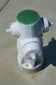 Close up of a fire hydrant on a street.
