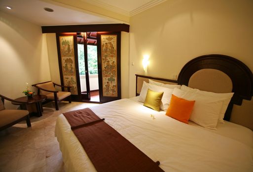 Nice bedroom with the big bed. Hotel Kartika. Bali