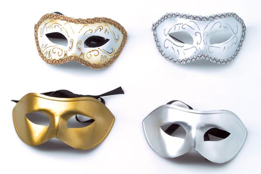 four carnival mask multy colors isolated in white background