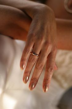 Hand of the bride in a wedding ring