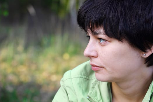 portrait of a beautiful pensive woman close up
