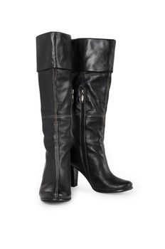 Pair of high black leather womans boots on white background. Isolated with clipping path