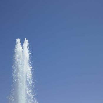 Fountain in the blue sky