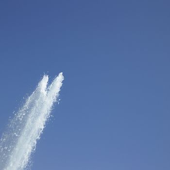 Fountain in the blue sky