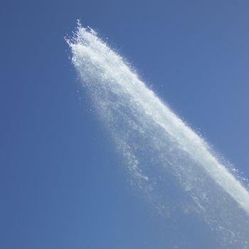 Fountain in the blue sky