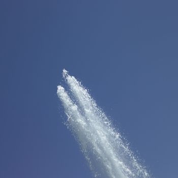 Fountain in the blue sky