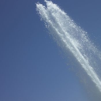 Fountain in the blue sky