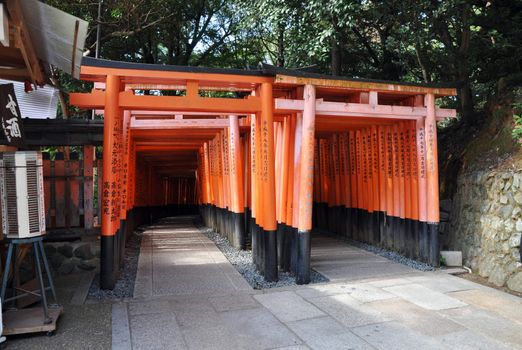 The Tori gates at Fushimi Inari Shrine in Kyoto, Japan. 