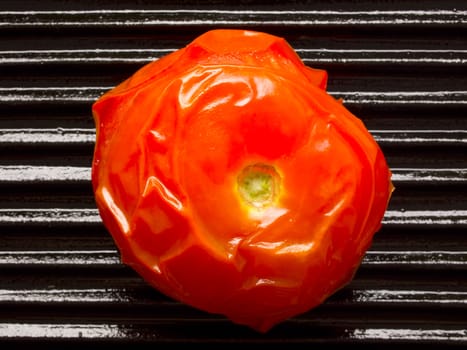 close up of a baked tomato