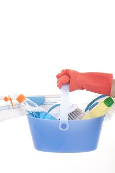 Plastic bucket with cleaning supplies on white background 