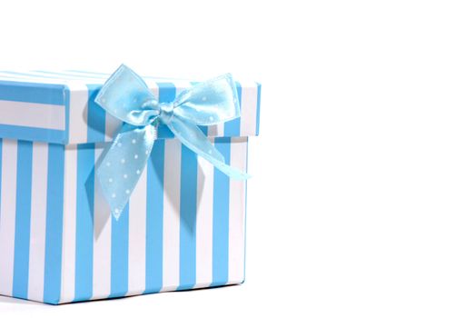 gift box with blue and white tie and space for text