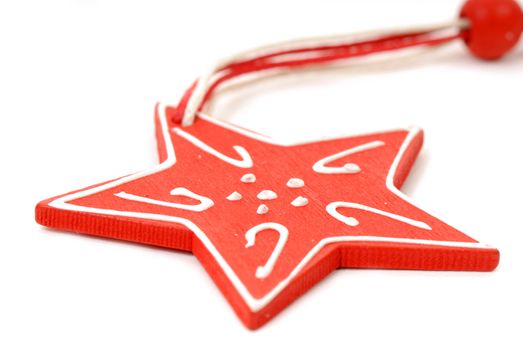 Christmas ornament wood red star on white background
