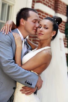 Beautiful the bride and the groom in park