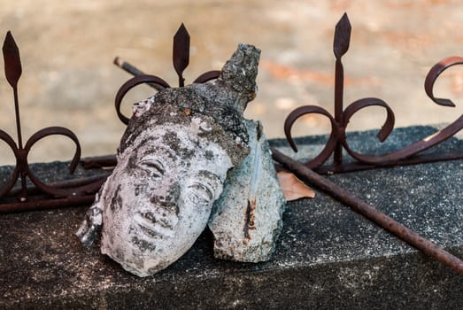 Neglected Buddha image's head at Ton Kok temple, Chiangmai, Thailand