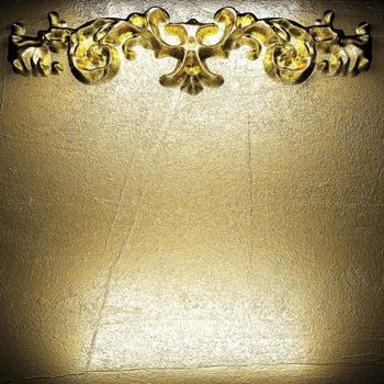 golden vintage ornament on wall