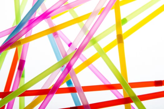 Drinkin straws isolated against a white background while being backlit