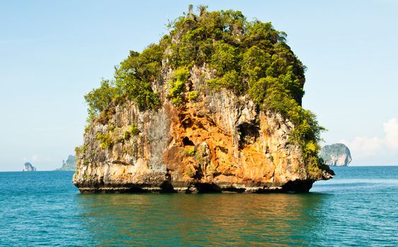 The mountain is a large rock in the sea. In southern Thailand.