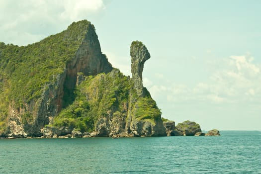 Mountains of rock shaped like a large animal is in the Andaman Sea thailand.