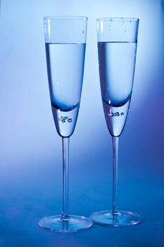 glass for champagne  on blue and red background