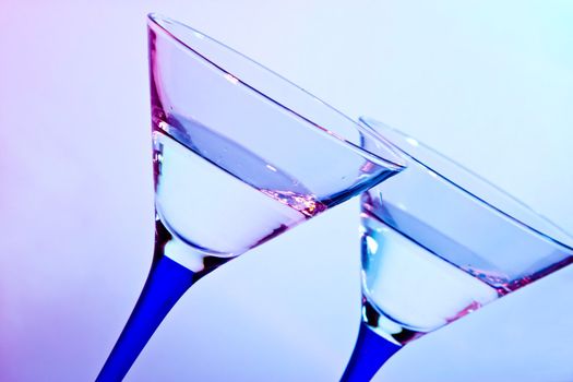 glass for martini  on blue and red background