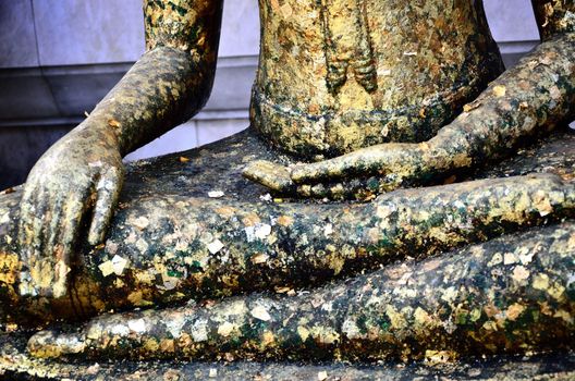 Meditation concept, Ancient Buddhist idol in temple, Bangkok, Thailand