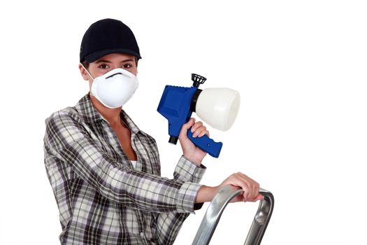 Woman holding a spray gun