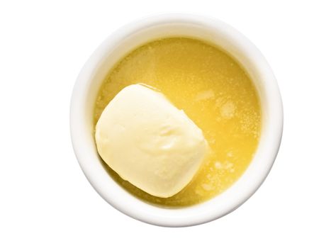 close up of a bowl of melted butter