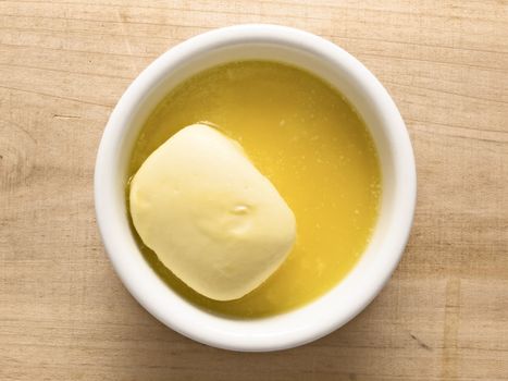 close up of a bowl of melted butter
