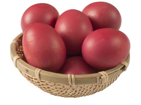 close up of a basket of chinese baby first birthday red eggs