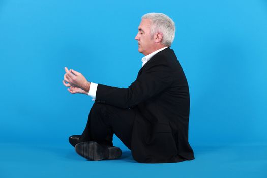 Businessman meditating