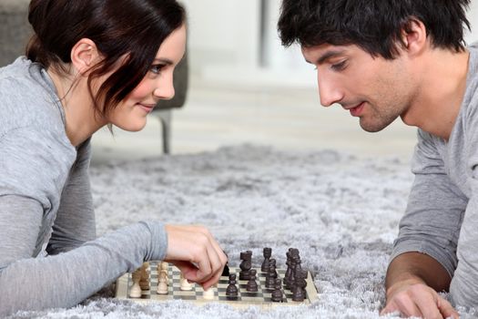 Couple playing chess