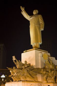 Mao Statue Heroes, Zhongshan Square, Shenyang, Liaoning Province, China at Night Lights Famous Statue built in 1969 in middle of Cultural Revolution.