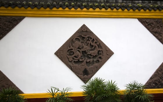 White Yellow Wall Carvings Wenshu Yuan Buddhist Temple Chengdu Sichuan China