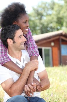 Couple hugging in the garden