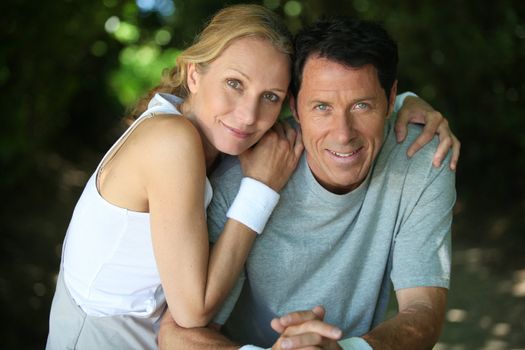 Landscape of tennis couple