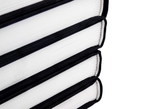 Closeup picture of spines of books on white background