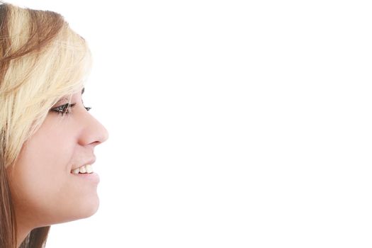 Portrait of a beautiful young woman looking away at copyspace against white background