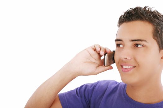 young smiley man speaking on his mobile. isolated on white, copyspace