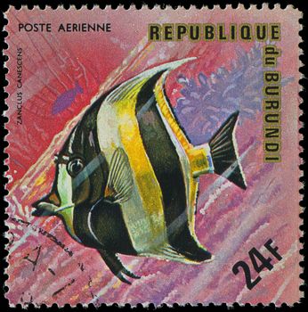 Republic of Burundi, - CIRCA 1975: A stamp printed by Burundi shows the fish Zanclus canescens, circa 1975