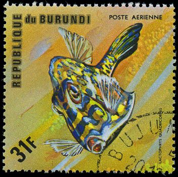 Republic of Burundi, - CIRCA 1975: A stamp printed by Burundi shows the fish Lactophrys quadricornis, circa 1975