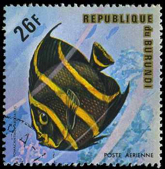 Republic of Burundi, - CIRCA 1975: A stamp printed by Burundi shows the fish Pomacanthus arouatus, circa 1975