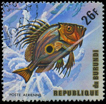 Republic of Burundi, - CIRCA 1975: A stamp printed by Burundi shows the fish Zeus faber, circa 1975