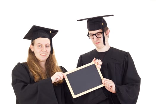 Two graduates in their academic gowns